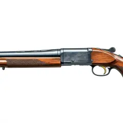 Fusil à canon scié, un objet dont la législation est stricte. Illustration d'une arme à feu avec crosse et garde-main en bois.